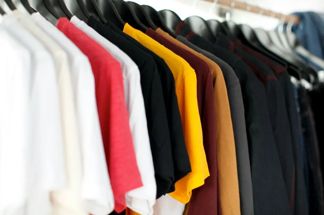 Racks of finished polo shirts on the J&R Apparel floor
